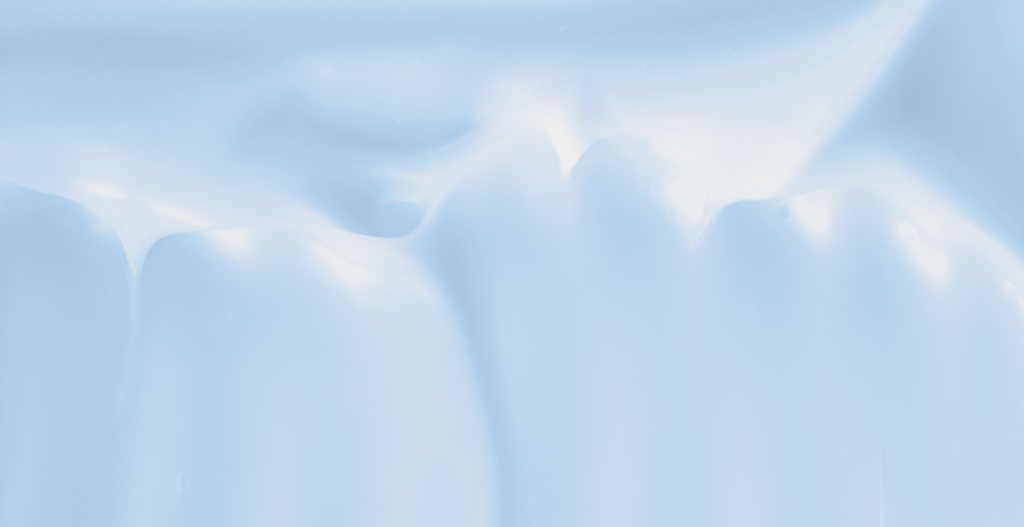 Textura cremosa en tonos azules, representando hidratación intensa para piel seca.