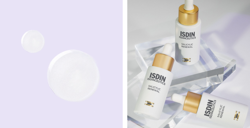 Sérum Salicylic Renewal de ISDIN Isdinceutics junto a gotas de su textura sobre un fondo lila claro.