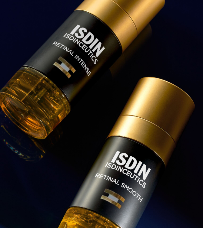 Sérums ISDINCEUTICS Retinal Intense y Retinal Smooth en envases dorados, opciones de renovación nocturna adaptadas a diferentes necesidades de la piel.