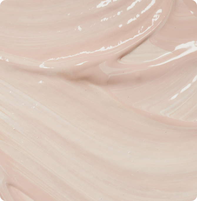 Detalle de textura cosmética suave y cremosa con péptidos, típica de productos de skincare ISDIN para reforzar la barrera cutánea.