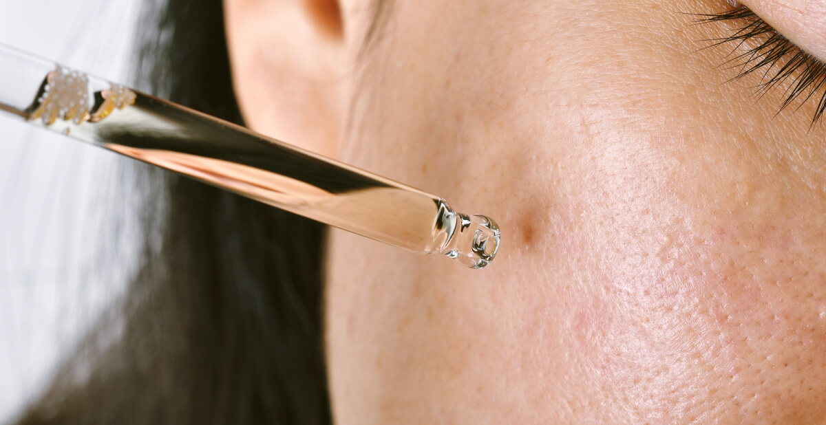 Serum on skin with visible pores